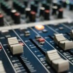 selective focus photo of DJ mixer