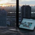 white and black high rise buildings during sunset